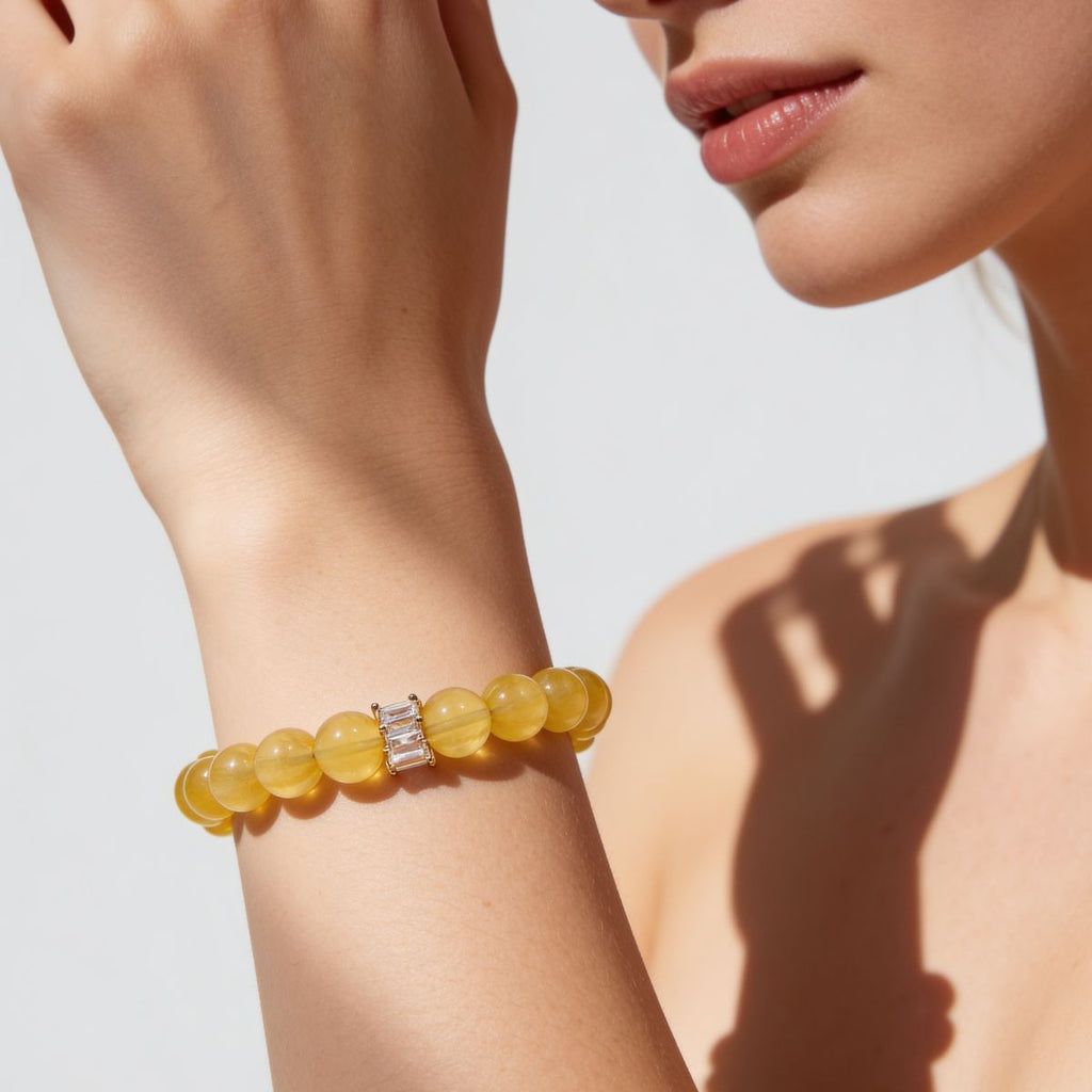 Sunlit Clarity Yellow Fluorite Beaded Bracelet styled on a woman’s wrist for a bright feminine lifestyle look