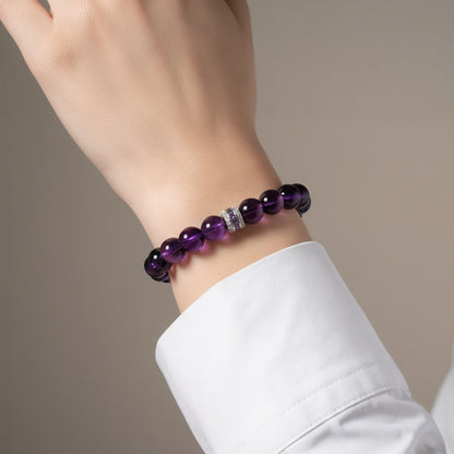elegant amethyst bracelet worn on wrist, purple crystal healing jewelry for calm and emotional balance