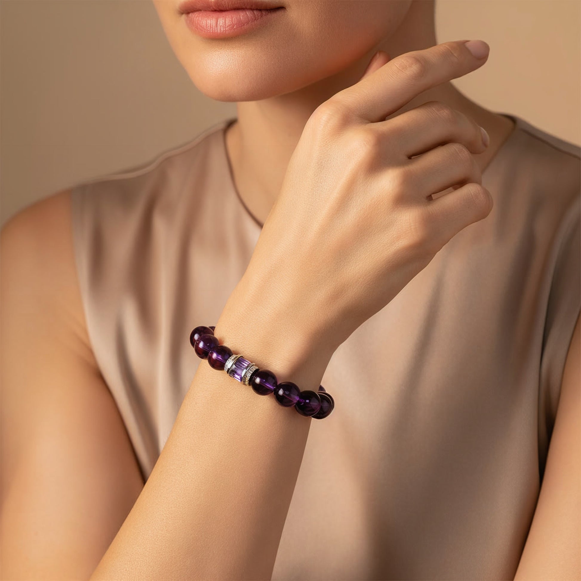 woman styling graceful amethyst bracelet, purple crystal jewelry for serenity and poise